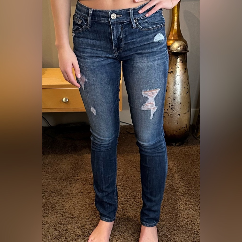 Express dark wash skinny jeans